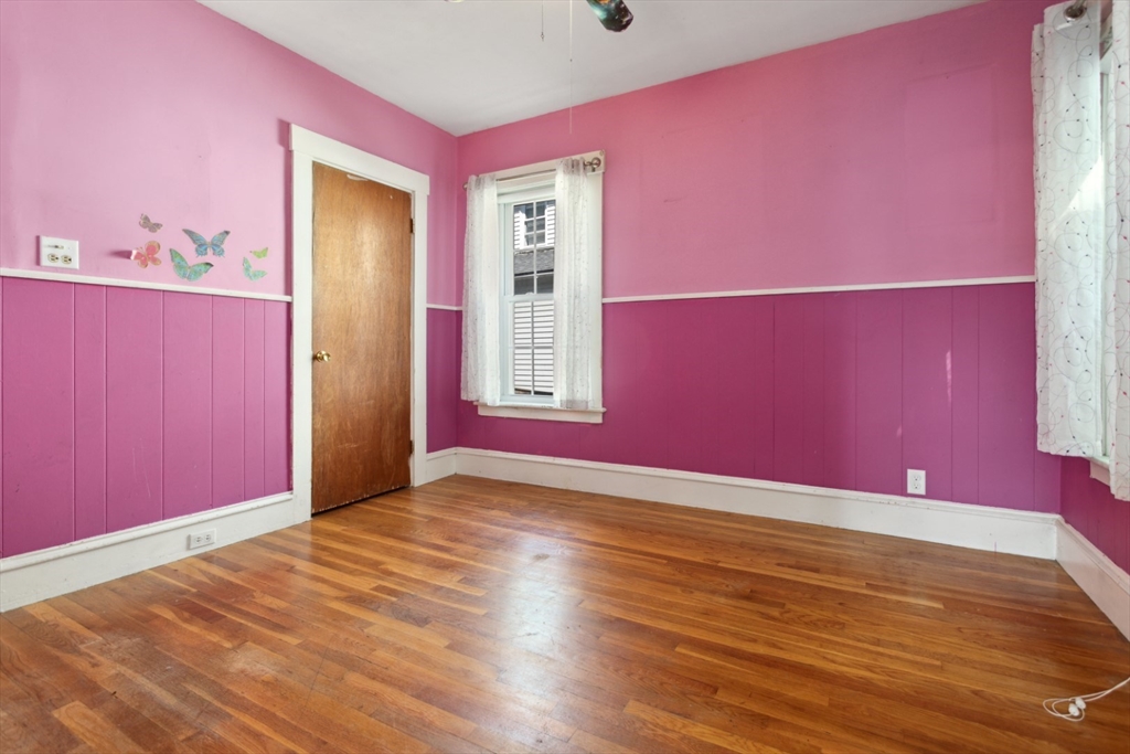 40 Village Street Reading, MA 01867 - Photo 17 of 36 a view of empty room with wooden floor