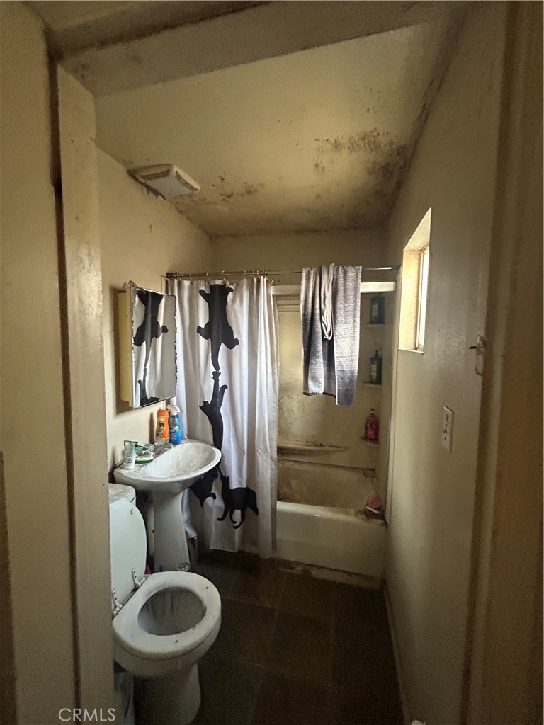 2258 Kaydel Road Whittier, CA 90601 - Photo 4 of 4 a bathroom with a sink toilet and shower