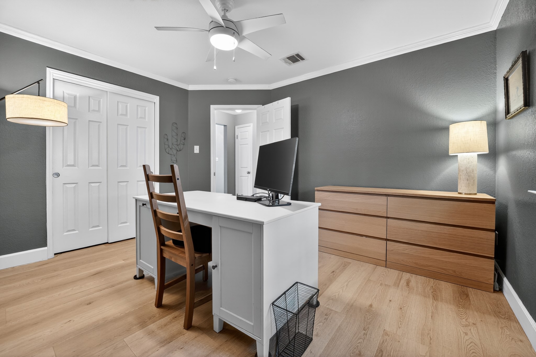 1811 Old Mill Road Cedar Park, TX 78613 - Photo 28 of 39 An inviting study features hardwood flooring and a ceiling fan for optimal comfort.