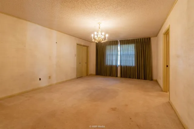 a bathroom with a sink and shower