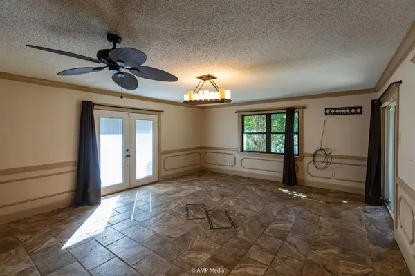 a bathroom with a double vanity sink mirror and shower