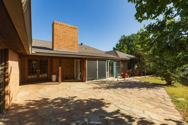a front view of a house with a outdoor space