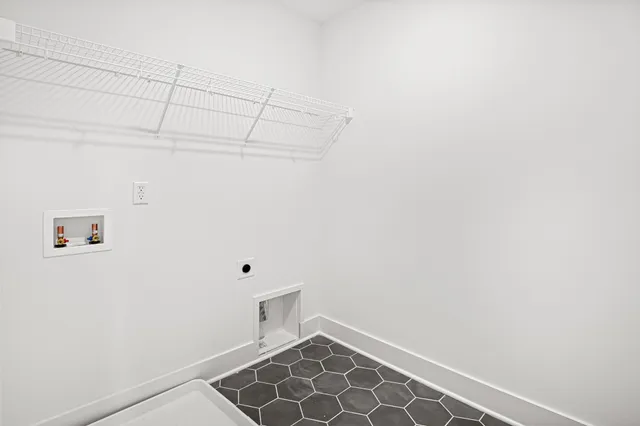 a view of empty room with windows