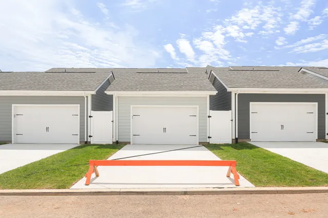 an empty room with closet area
