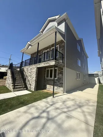 a house with trees in front of it