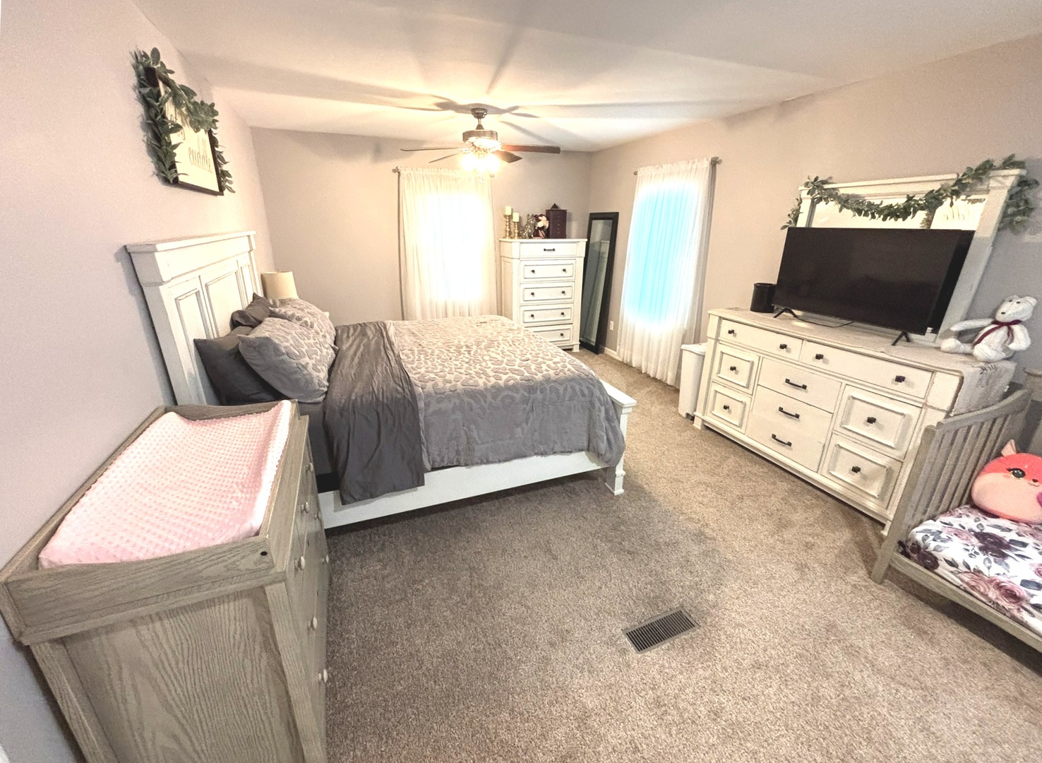 440 North Indiana Avenue Salem, IL 62881 - Photo 7 of 15 a bedroom with furniture and a flat screen tv