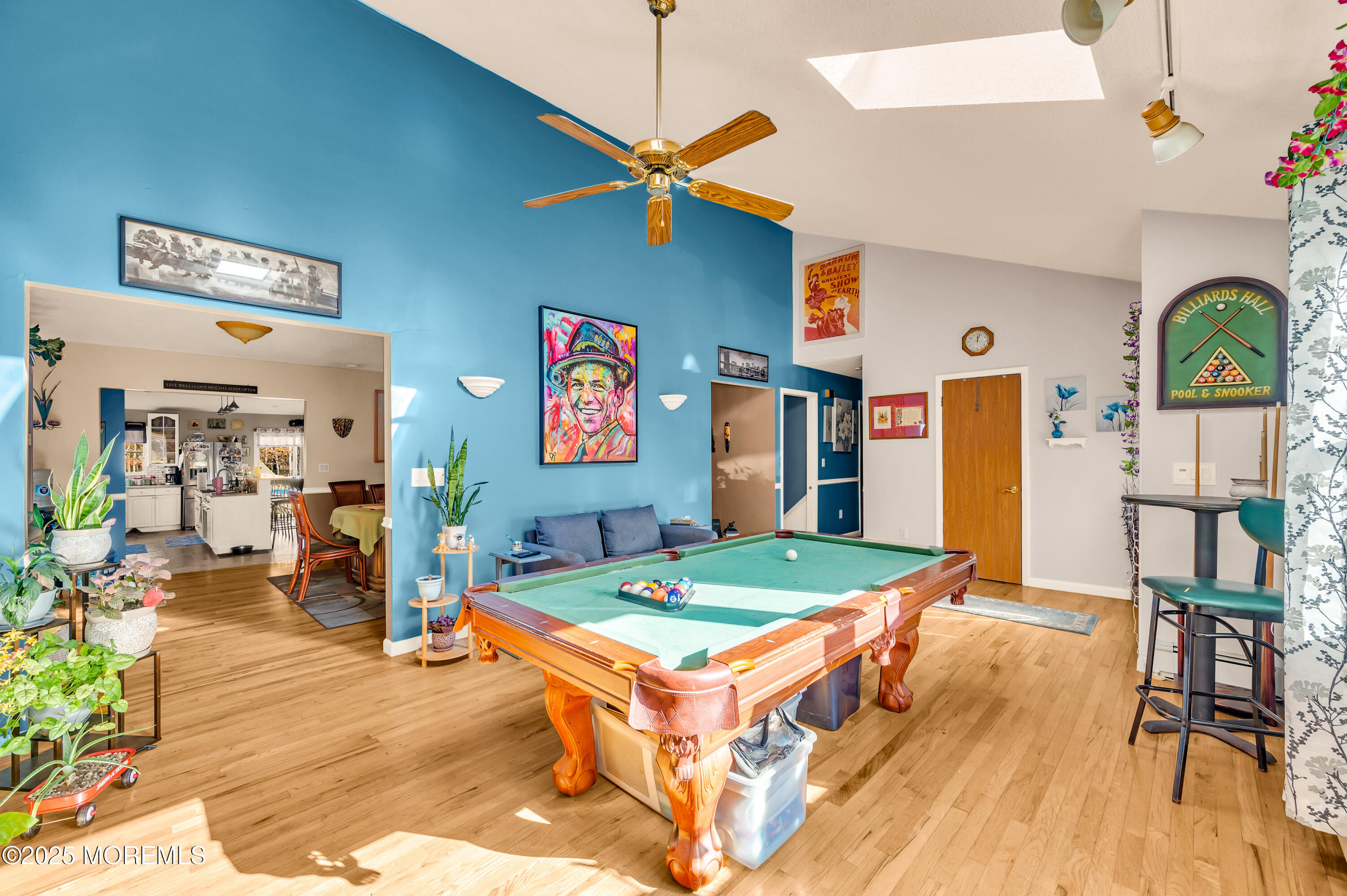 98 Bowman Road Jackson, NJ 08527 - Photo 12 of 61 a living room with stainless steel appliances kitchen island granite countertop furniture and a table