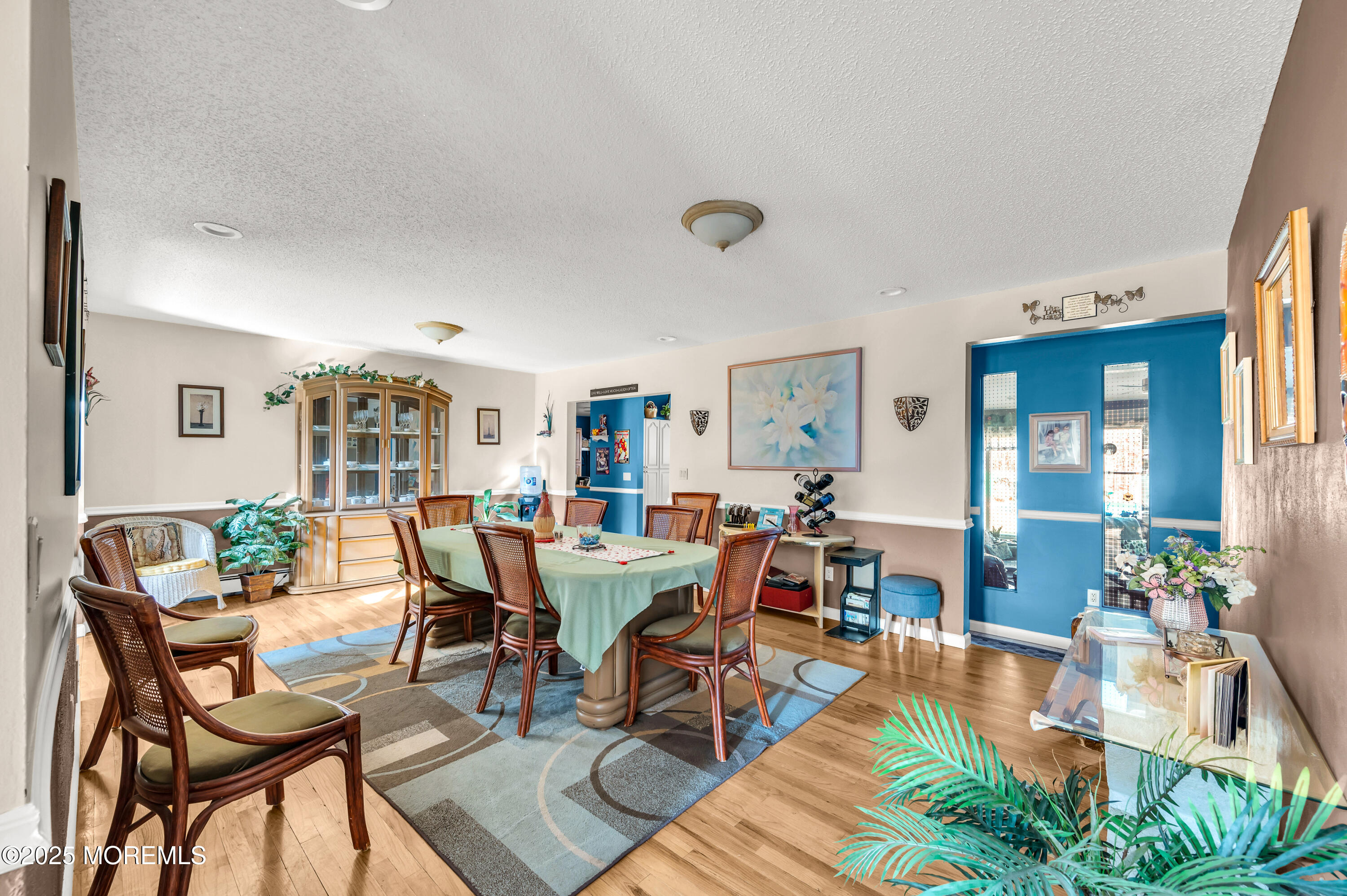 98 Bowman Road Jackson, NJ 08527 - Photo 15 of 61 a view of a dining room with furniture and wooden floor