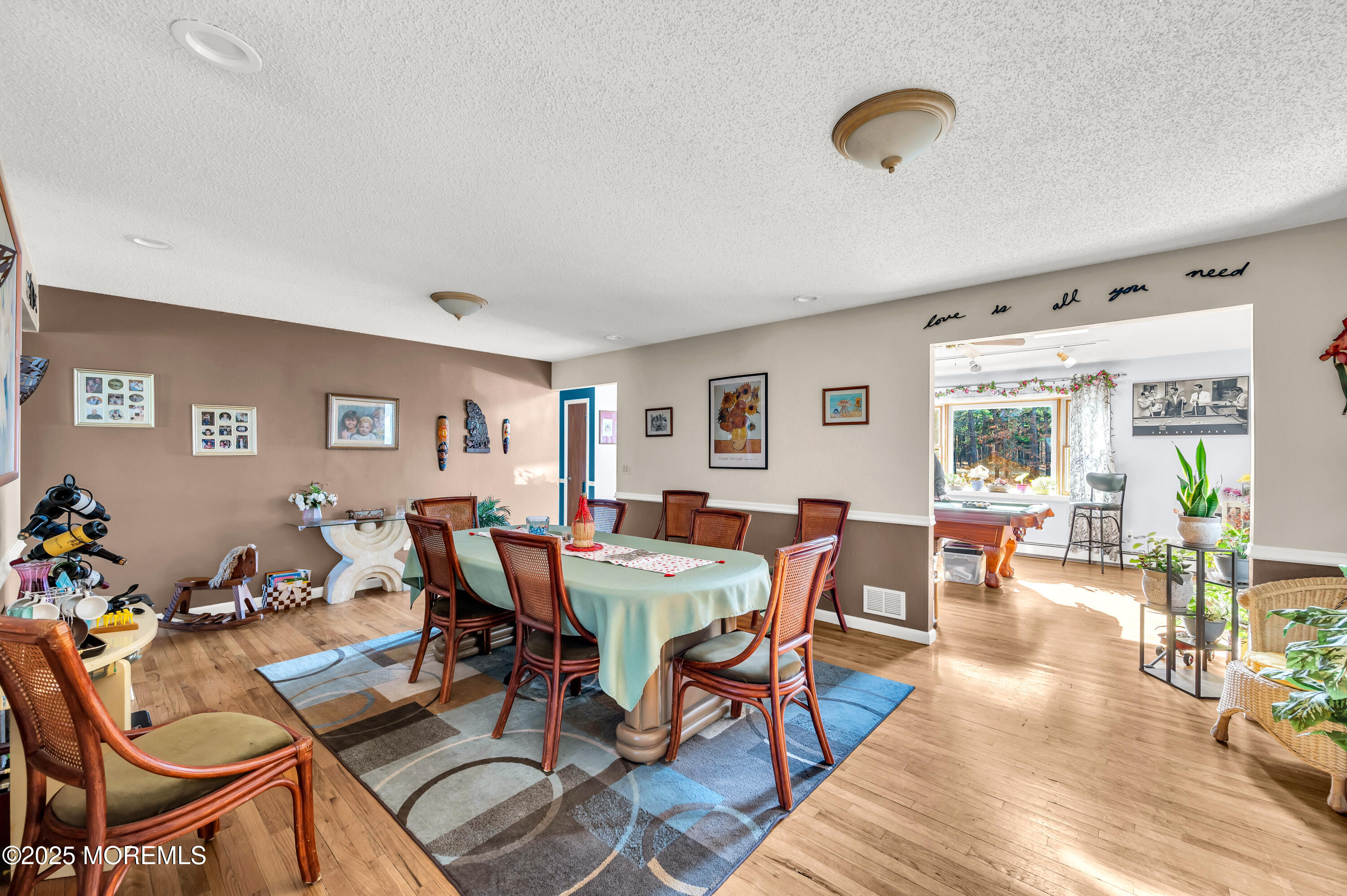 98 Bowman Road Jackson, NJ 08527 - Photo 17 of 61 a view of a dining room with furniture window and wooden floor