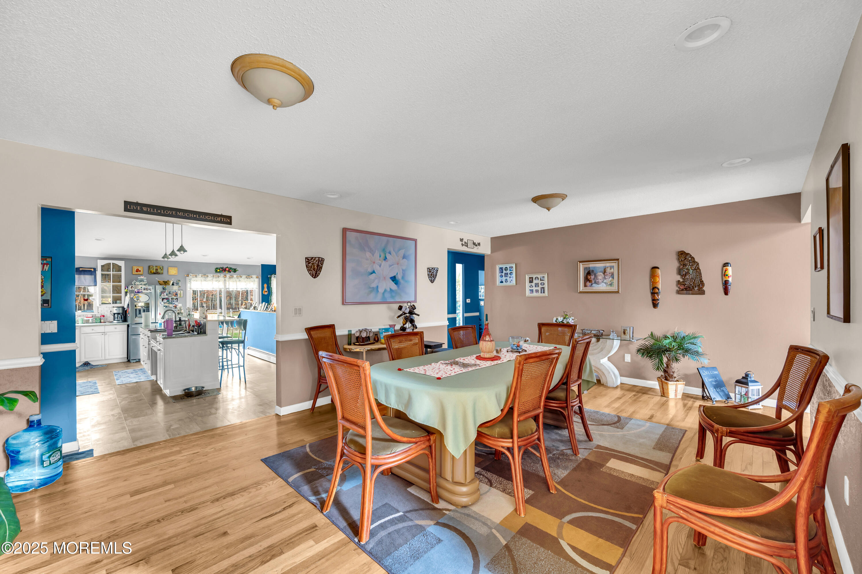98 Bowman Road Jackson, NJ 08527 - Photo 18 of 61 a view of a dining room with furniture and wooden floor