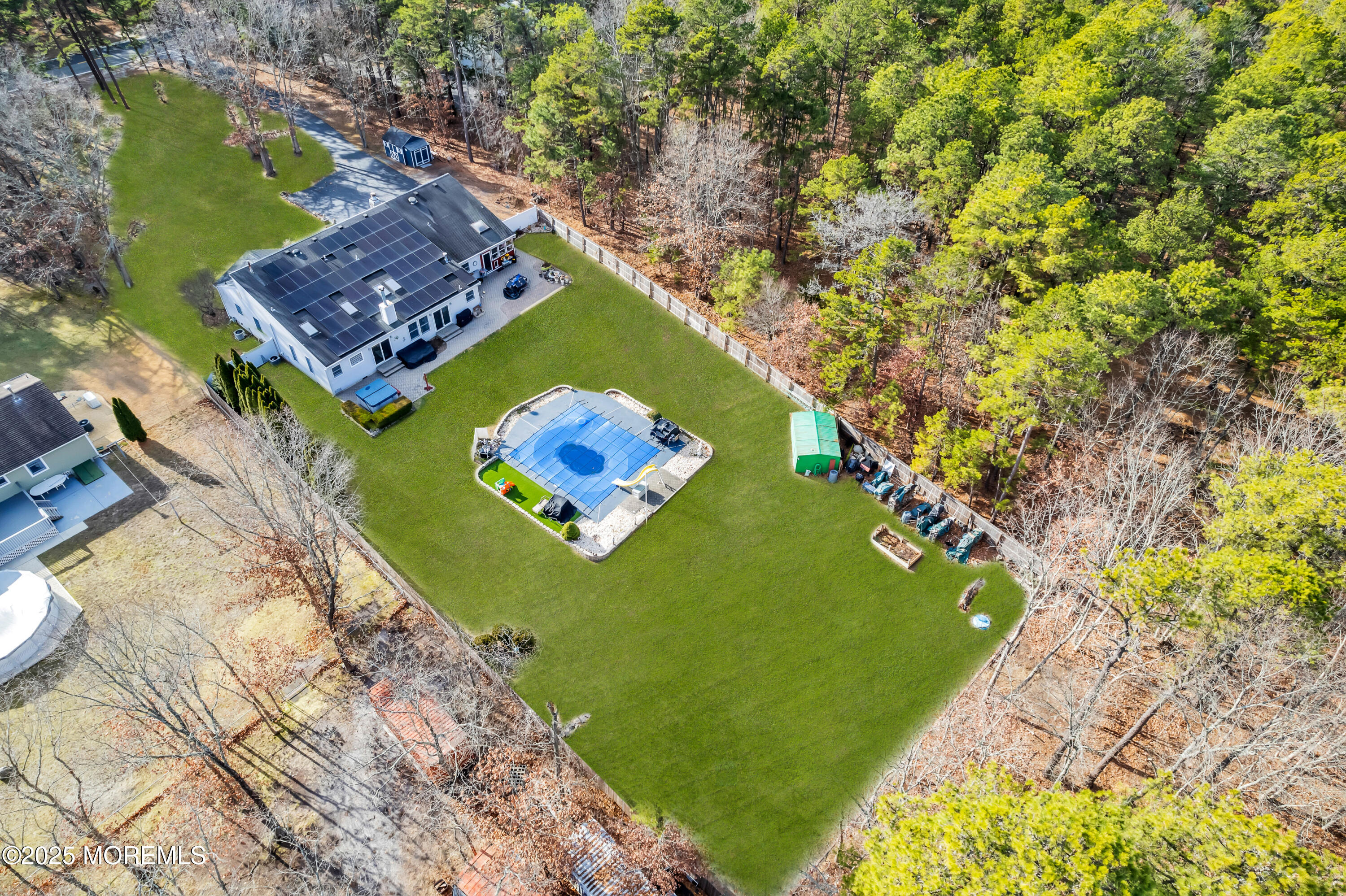 98 Bowman Road Jackson, NJ 08527 - Photo 29 of 61 a view of a back yard of the house
