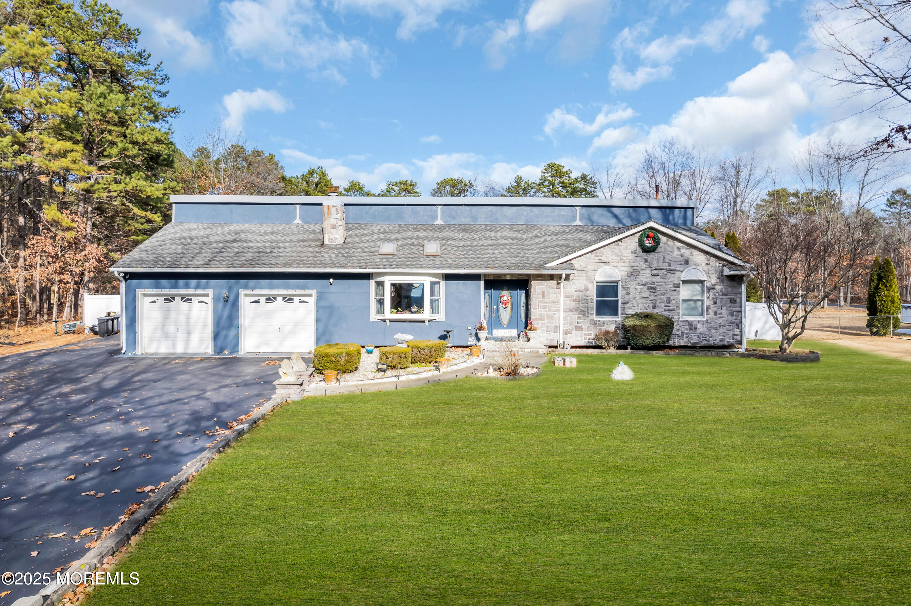 98 Bowman Road Jackson, NJ 08527 - Photo 31 of 61 a front view of house with yard barbeque and outdoor seating