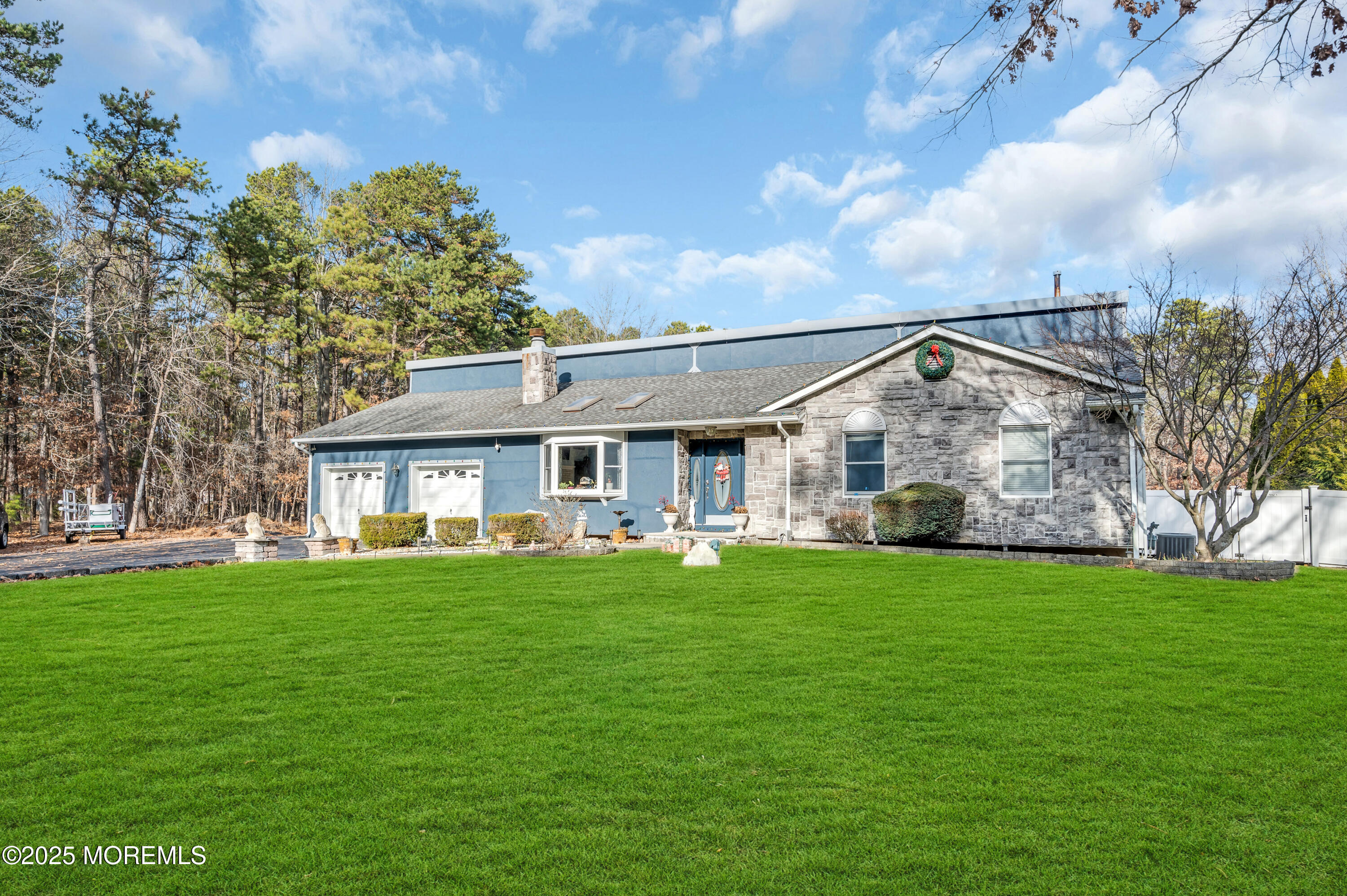 98 Bowman Road Jackson, NJ 08527 - Photo 32 of 61 a view of a house with a big yard and large trees