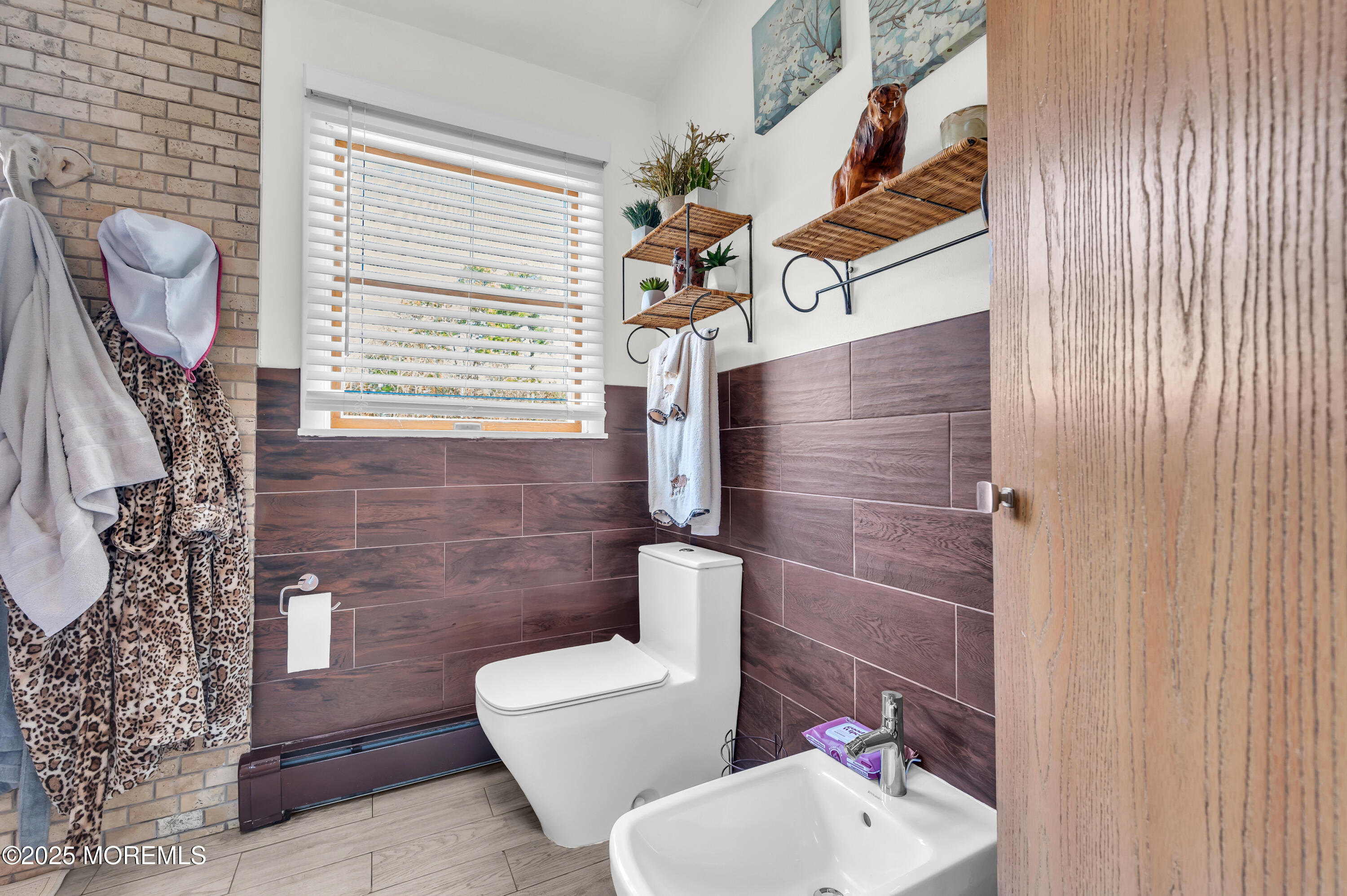 98 Bowman Road Jackson, NJ 08527 - Photo 34 of 61 a bathroom with a toilet sink and mirror