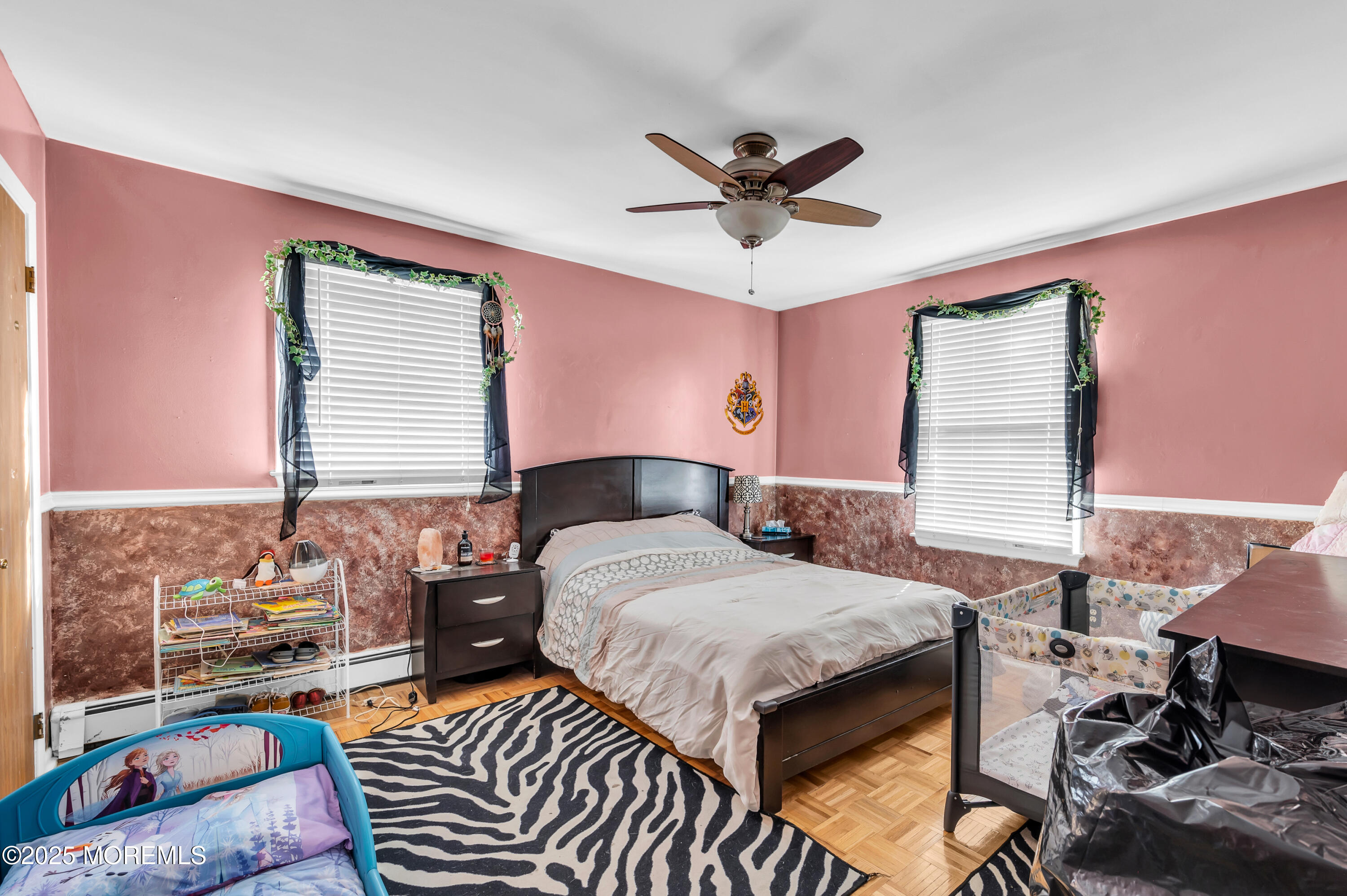 98 Bowman Road Jackson, NJ 08527 - Photo 36 of 61 a bedroom with a bed and wooden floor