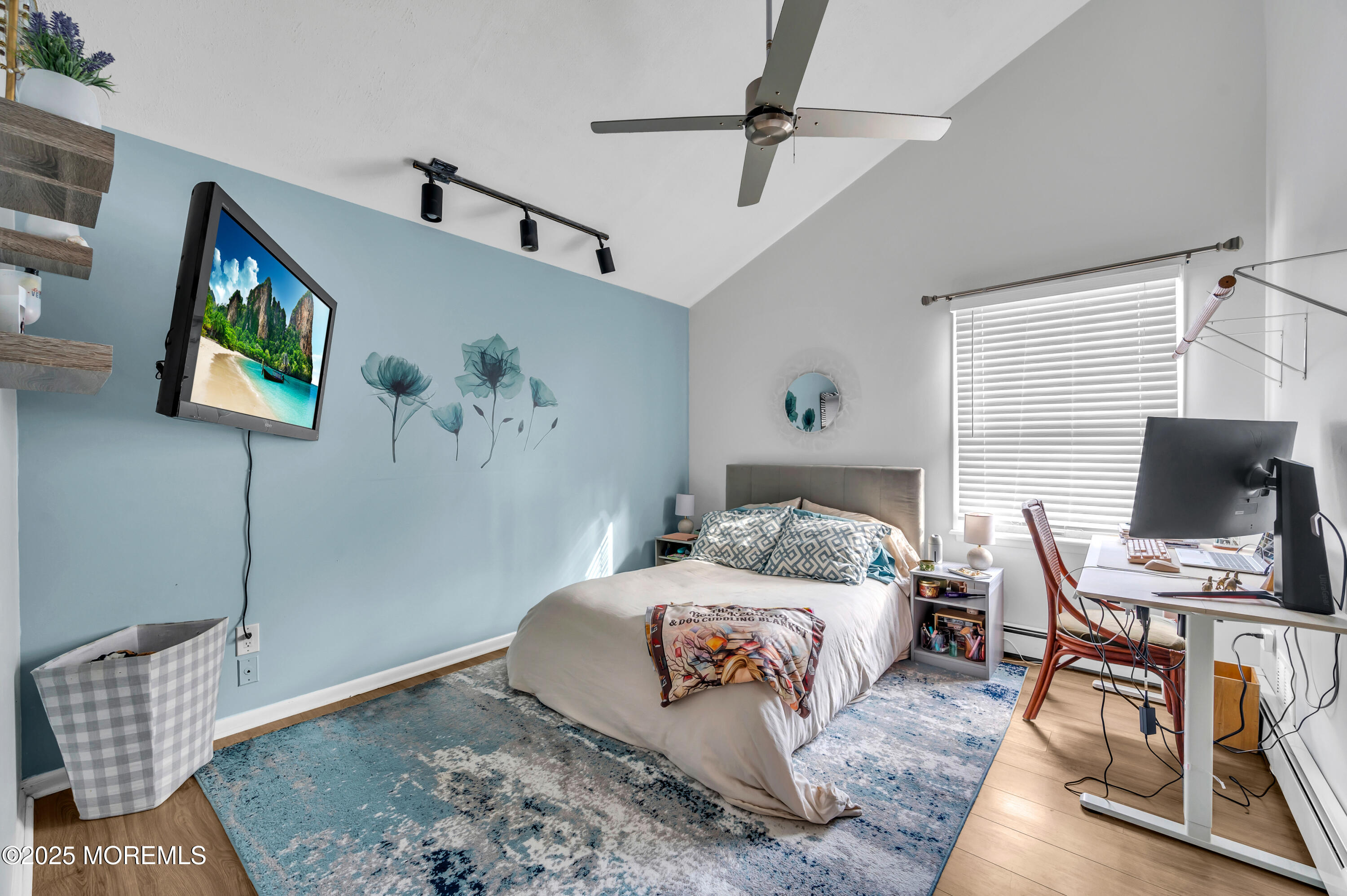 98 Bowman Road Jackson, NJ 08527 - Photo 38 of 61 a bedroom with a bed and a flat screen tv