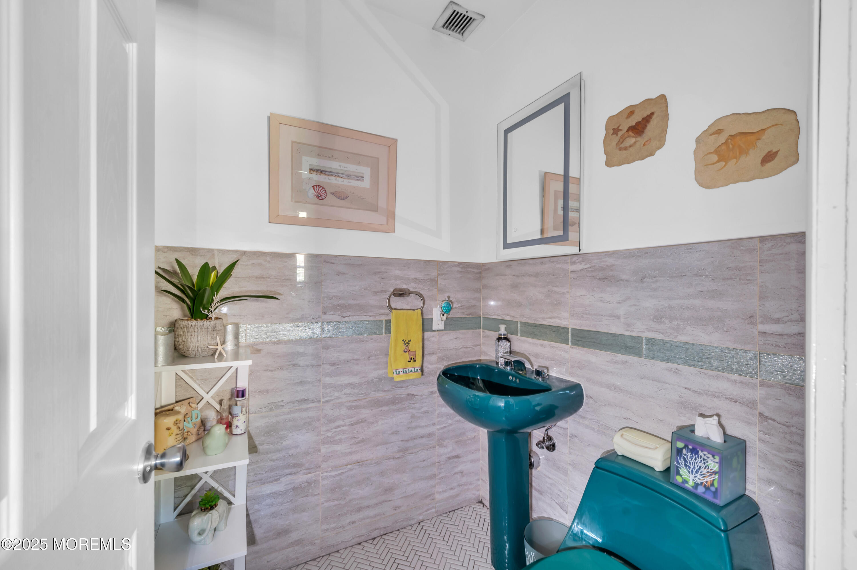 98 Bowman Road Jackson, NJ 08527 - Photo 39 of 61 a bathroom with a sink and a mirror