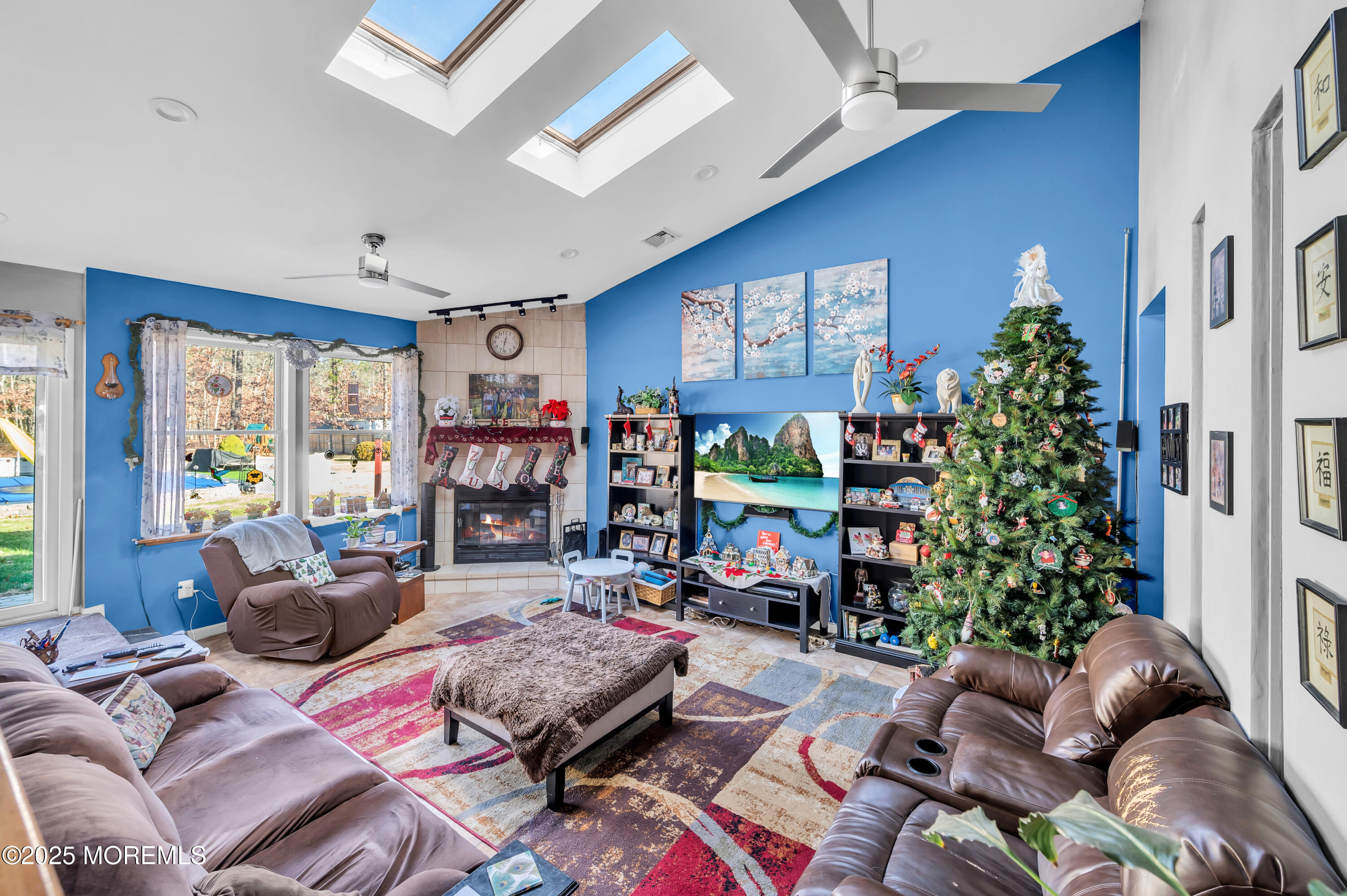 98 Bowman Road Jackson, NJ 08527 - Photo 52 of 61 a living room with furniture and a potted plant