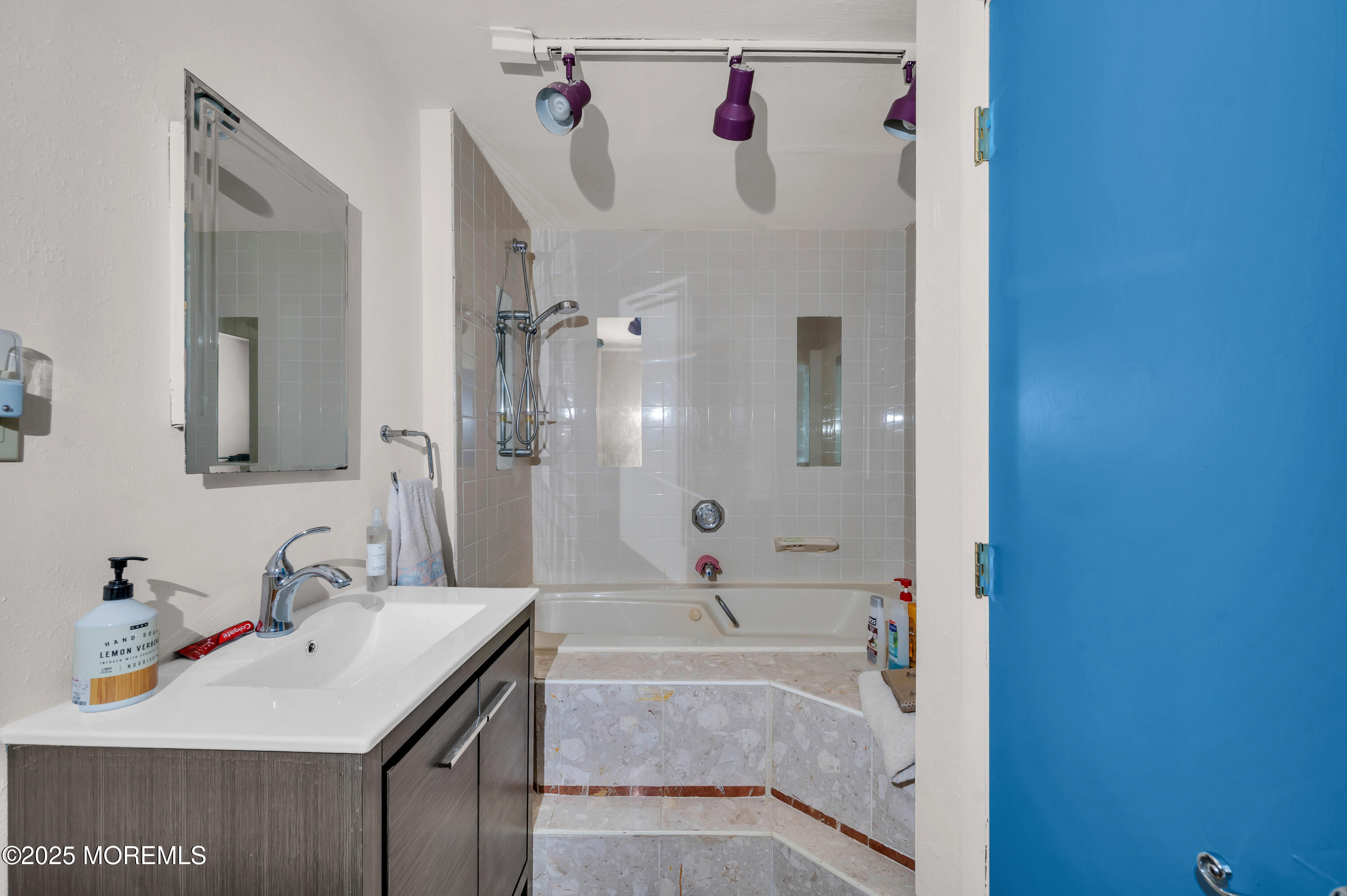 98 Bowman Road Jackson, NJ 08527 - Photo 55 of 61 a bathroom with a sink and a mirror