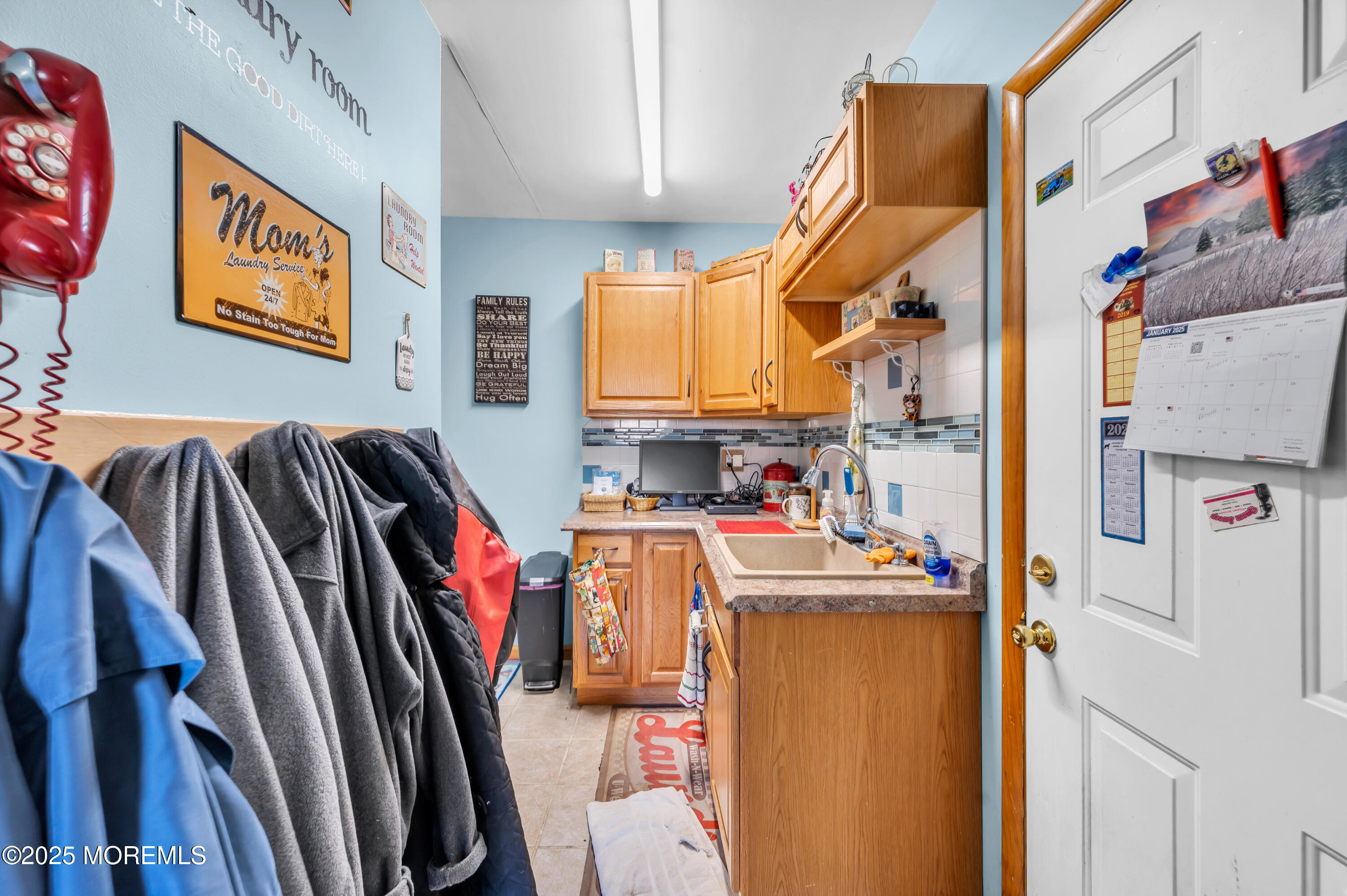 98 Bowman Road Jackson, NJ 08527 - Photo 58 of 61 a view of walk in closet with clothes and shoes