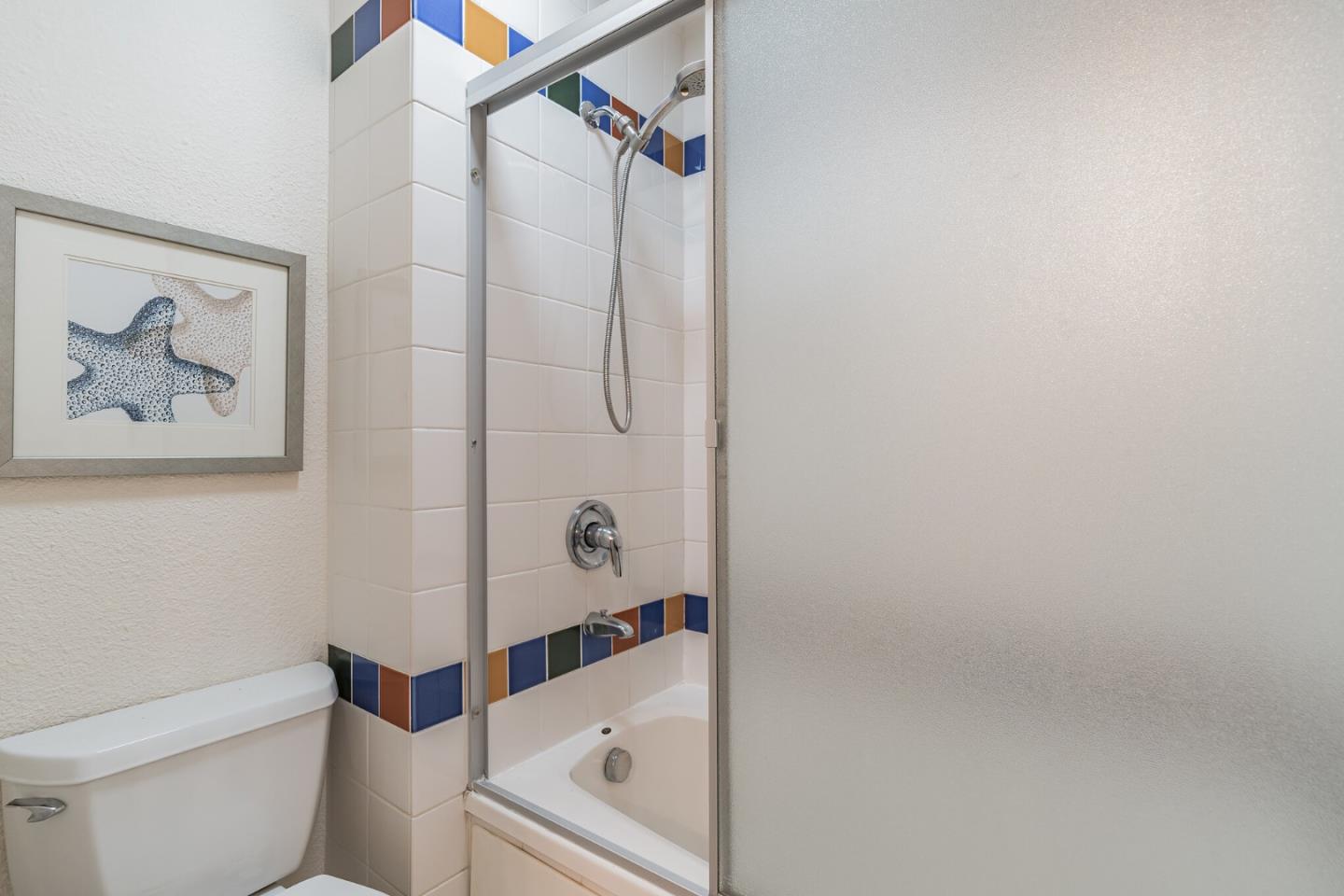348 Innisfree Drive, Unit 60 Daly City, CA 94015 - Photo 14 of 21 a bathroom with a toilet and a shower