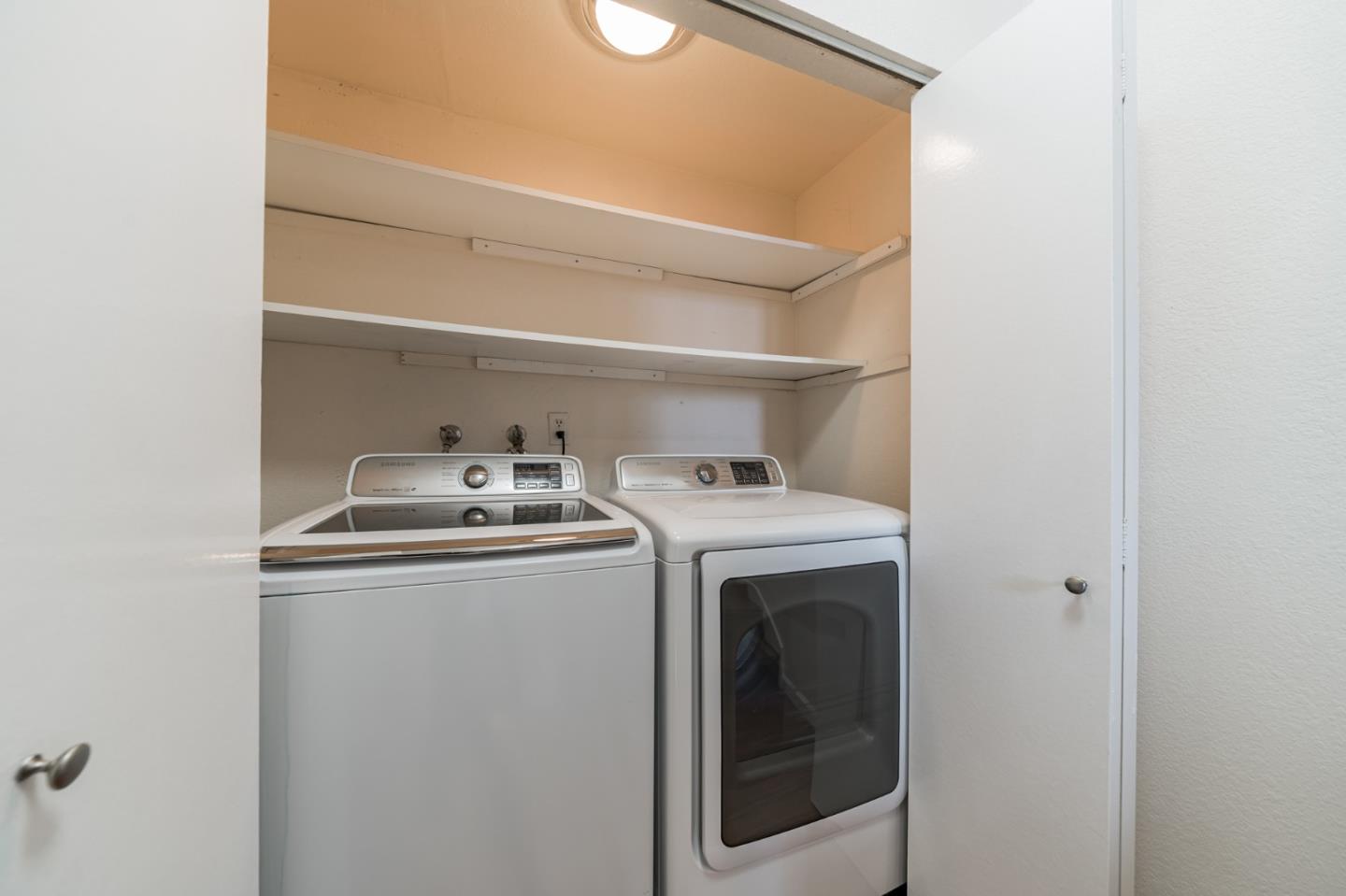 348 Innisfree Drive, Unit 60 Daly City, CA 94015 - Photo 15 of 21 a utility room with dryer and washer