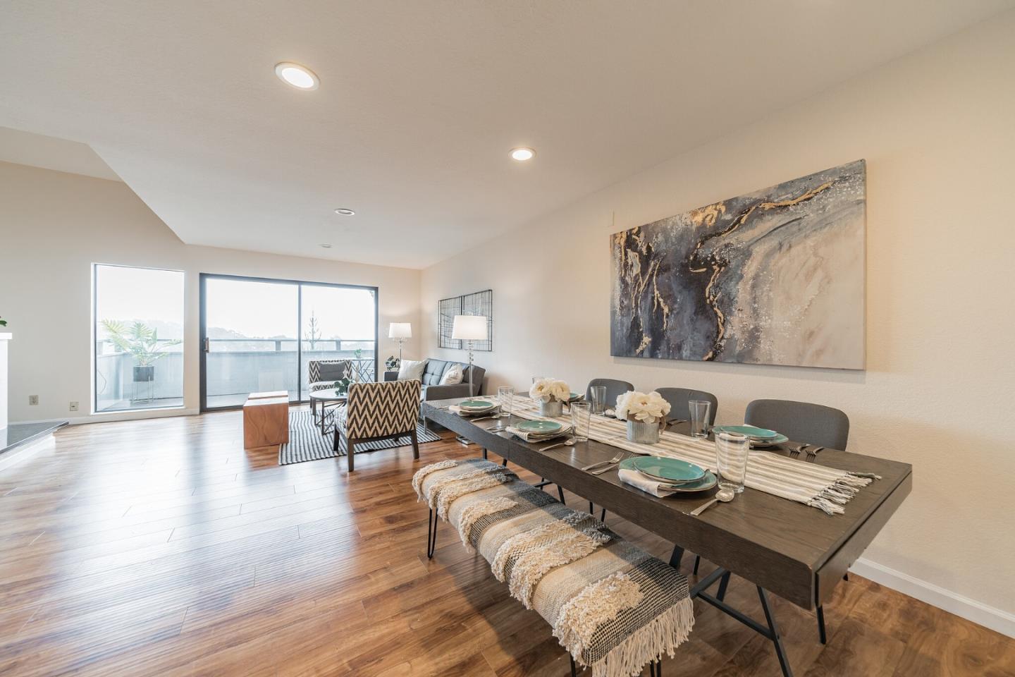 348 Innisfree Drive, Unit 60 Daly City, CA 94015 - Photo 4 of 21 a living room with furniture and floor to ceiling window