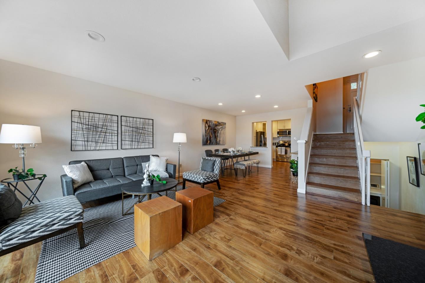 348 Innisfree Drive, Unit 60 Daly City, CA 94015 - Photo 5 of 21 a living room with furniture and wooden floor