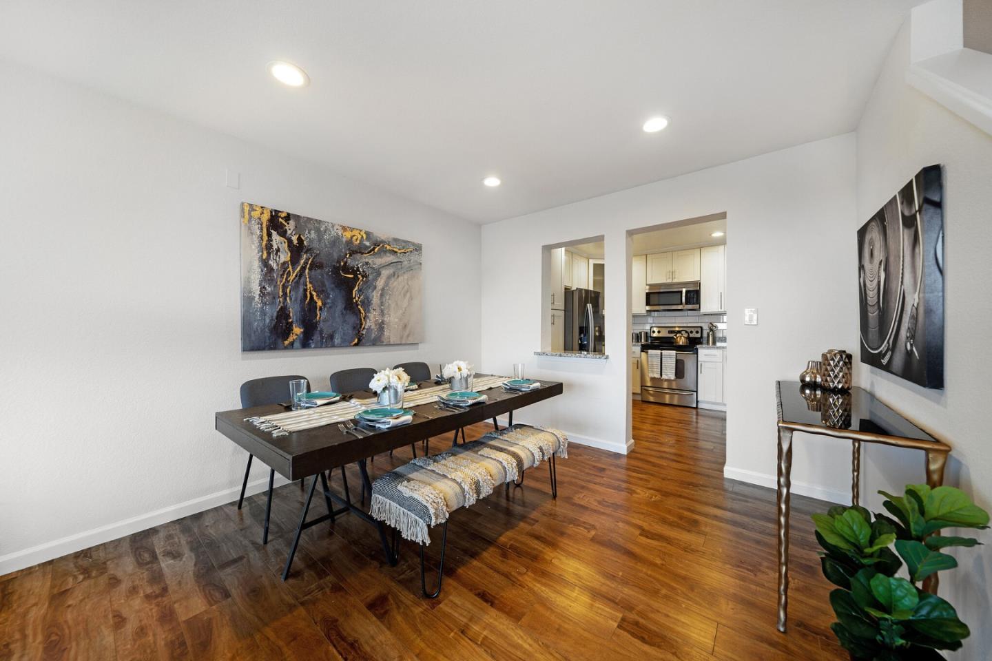 348 Innisfree Drive, Unit 60 Daly City, CA 94015 - Photo 6 of 21 a living room with furniture and a flat screen tv