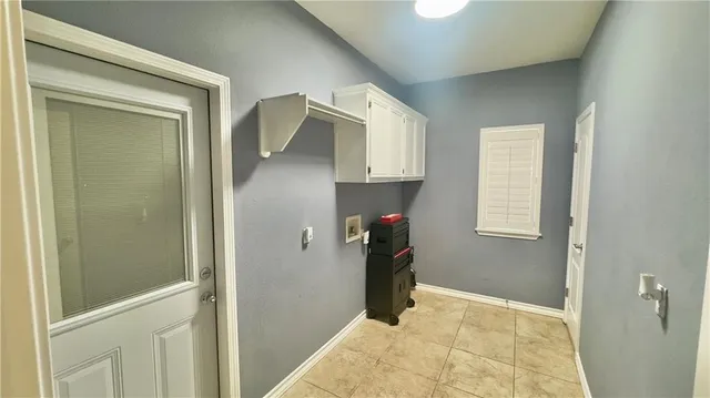 a view of storage and utility room in a kitchen