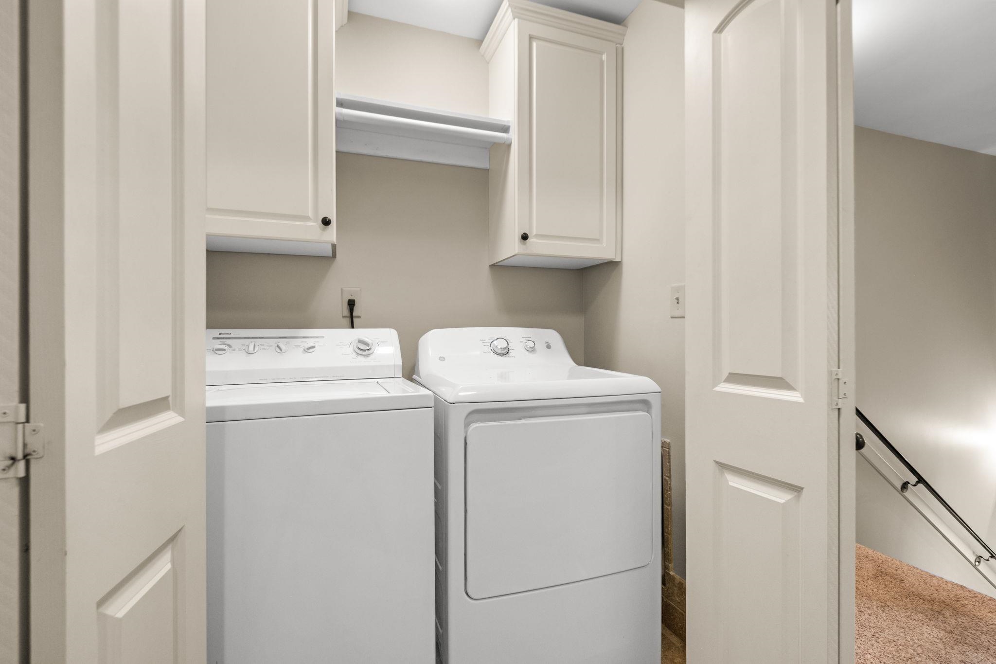 2275 McVay Road, Unit 2275 Germantown, TN 38138 - Photo 25 of 40 a utility room with dryer and washer