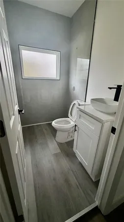 a bathroom with a sink and a toilet