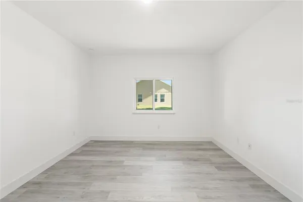 an empty room with a window