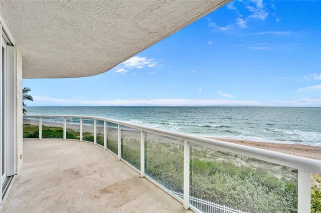a view of ocean from a balcony