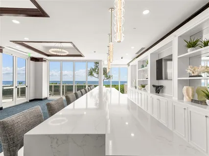 a view of a living room with a large window