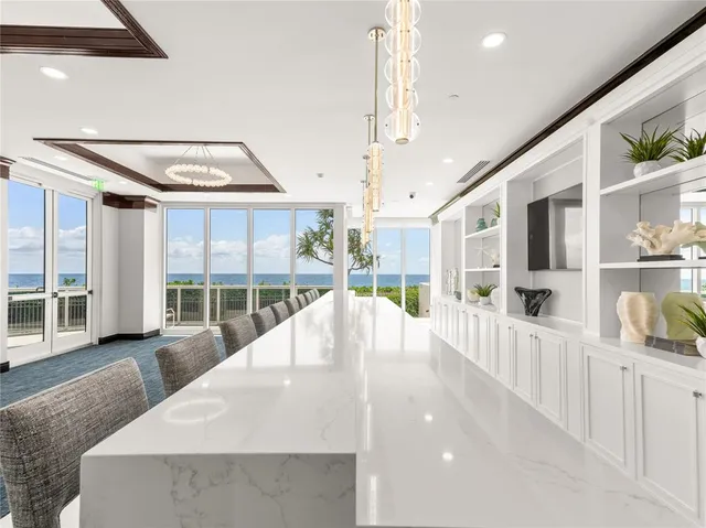 a view of a living room with a large window