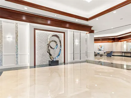 a view of a hallway with a window