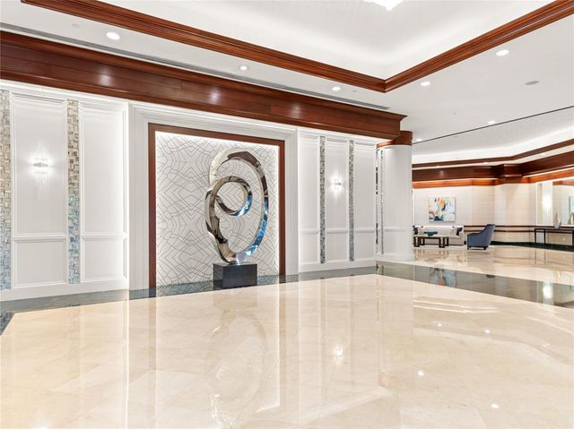 a view of a hallway with a window