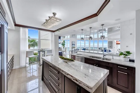a kitchen with a counter space cabinets and appliances