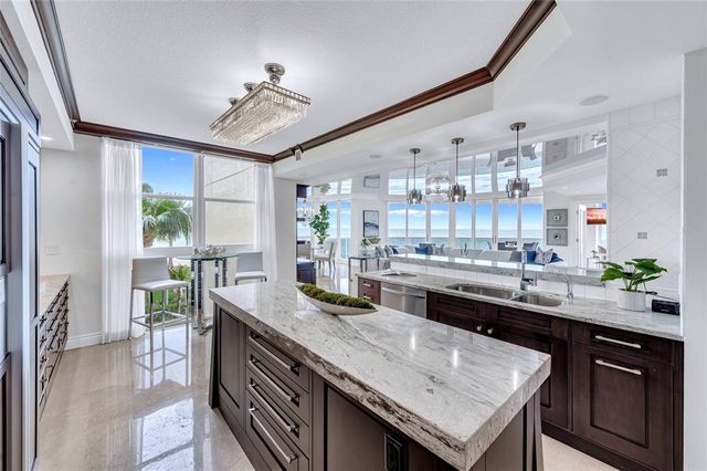 a kitchen with a counter space cabinets and appliances