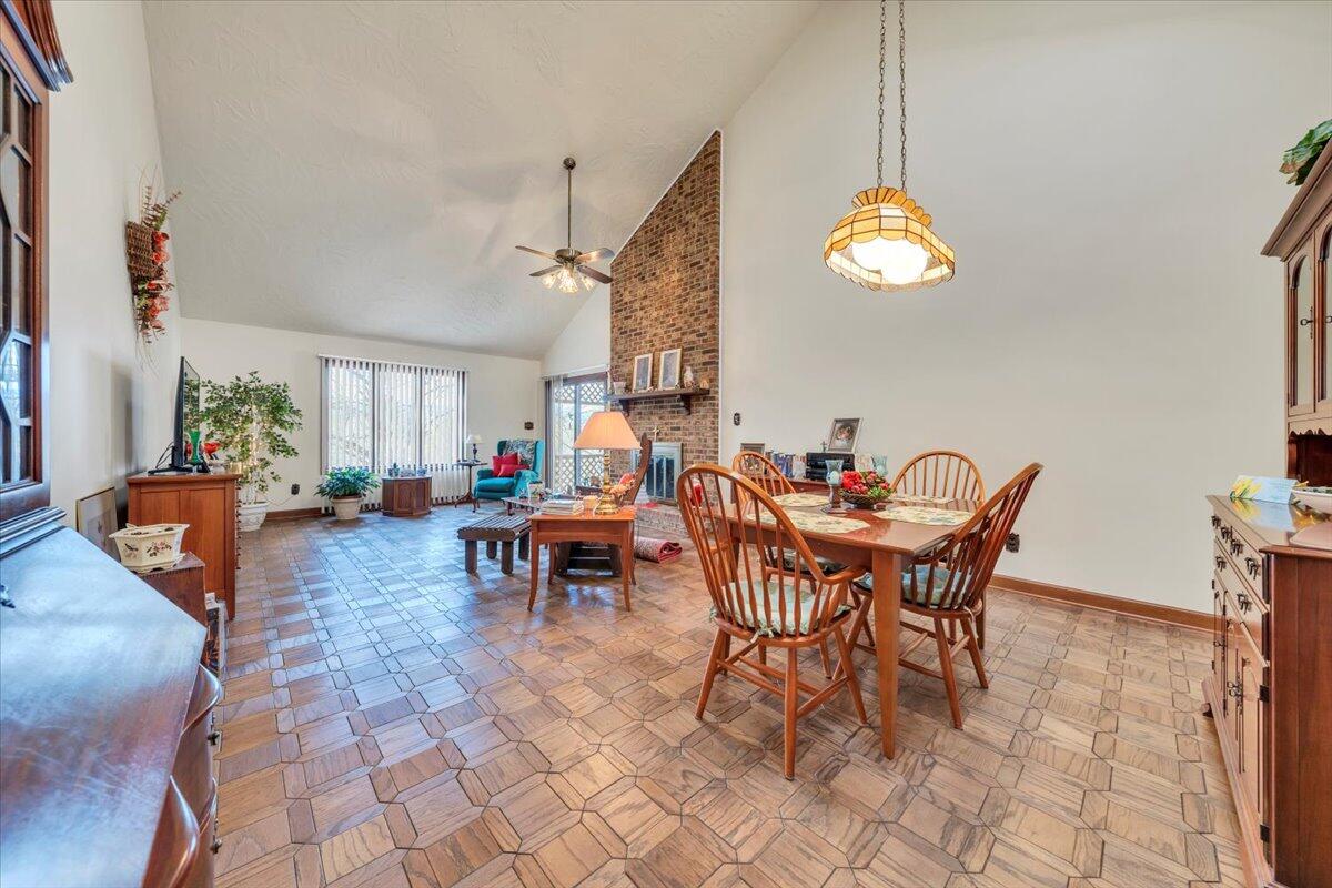 2409 South Clearing Road Salem, VA 24153 - Photo 12 of 45 a view of a dining room and kitchen with furniture window and wooden floor