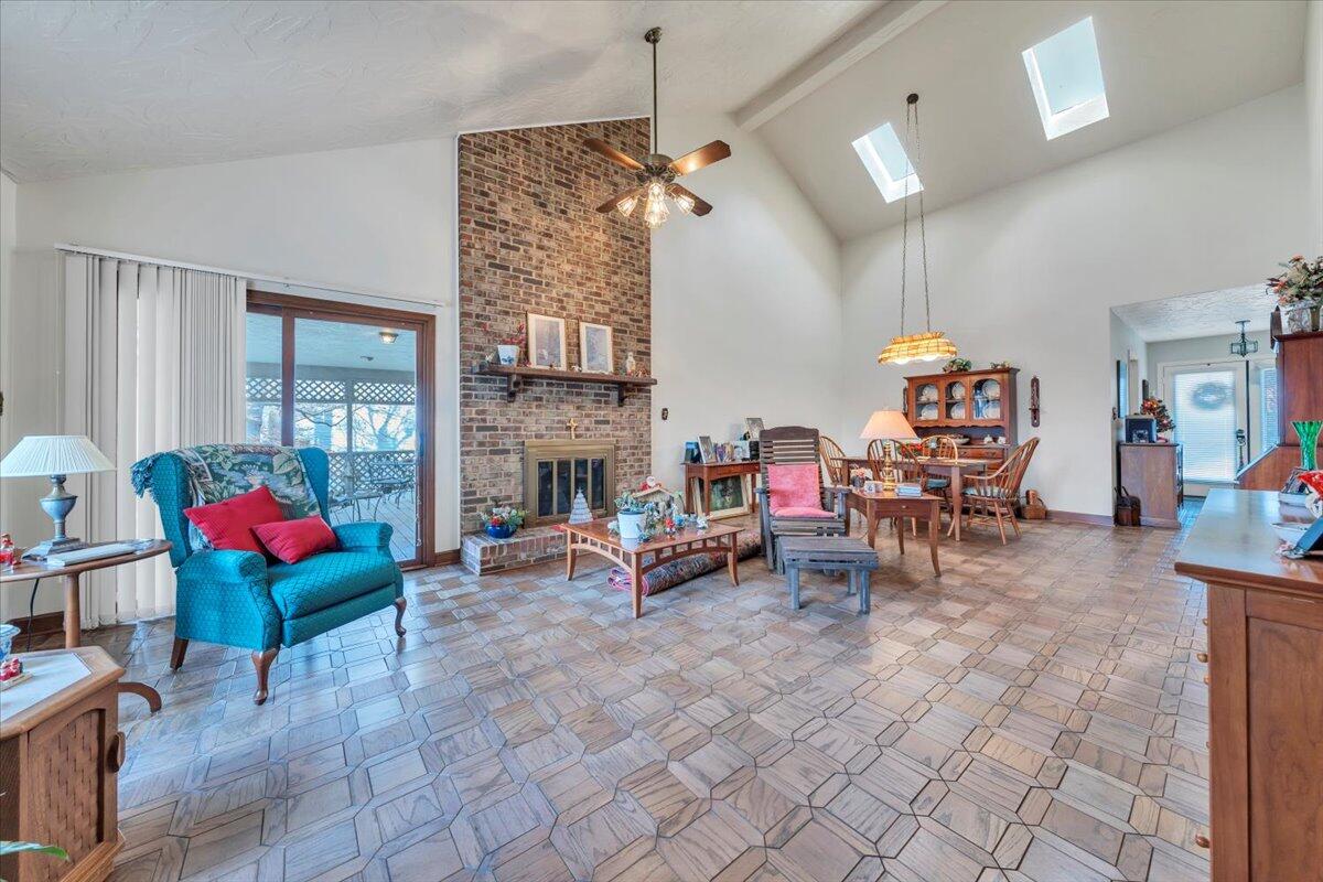 2409 South Clearing Road Salem, VA 24153 - Photo 18 of 45 a living room with furniture and a fireplace