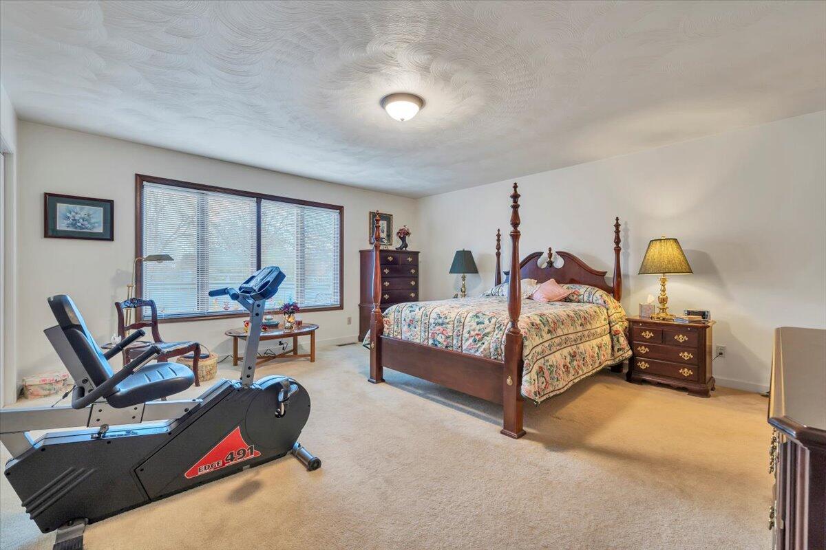 2409 South Clearing Road Salem, VA 24153 - Photo 25 of 45 a bedroom with a bed and window
