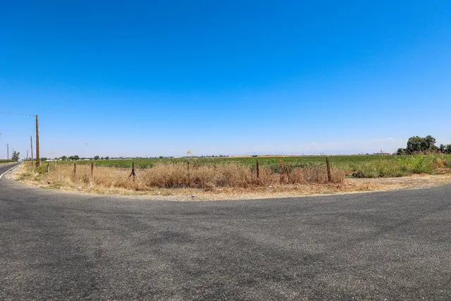a view of a road with an ocean view