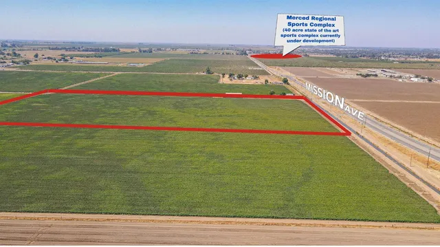 a sign on a wall next to a building