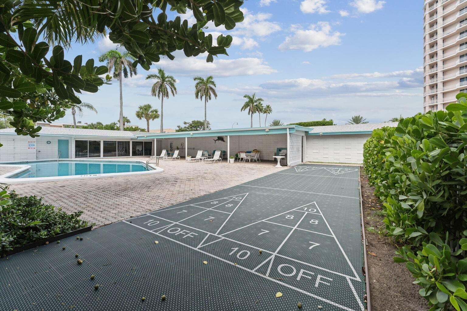 1470 South Ocean Boulevard, Unit 901 Lauderdale-by-the-Sea, FL 33062 - Photo 11 of 13 a view of a house with a patio
