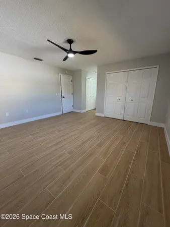 a spacious bathroom with a sink a mirror and a vanity