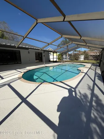 a view of a backyard of a house