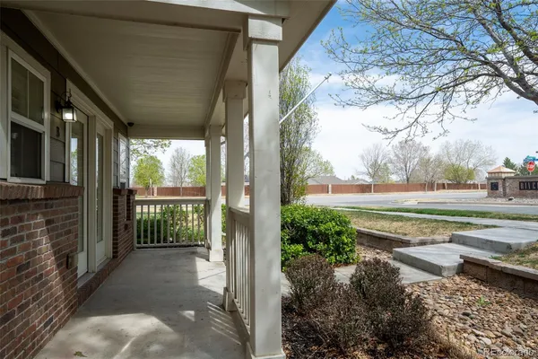 a view of a porch with a backyard