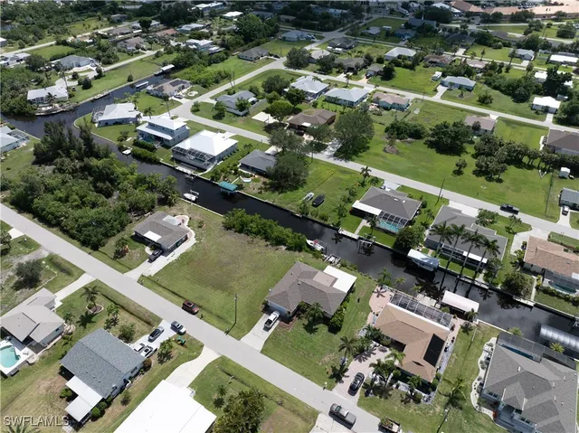 an aerial view of a city with lots of residential buildings